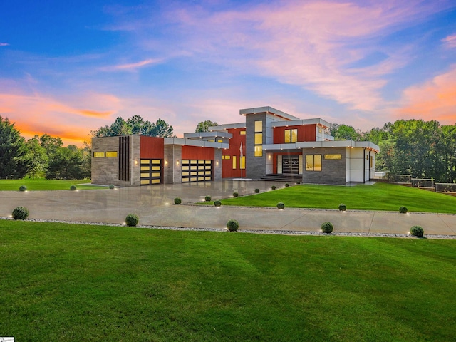 contemporary house featuring a yard