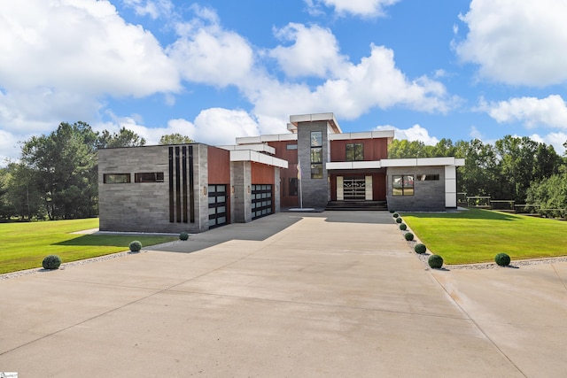 contemporary home with a front lawn