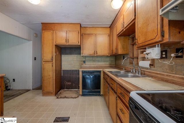 kitchen featuring light tile floors, range hood, sink, backsplash, and black dishwasher