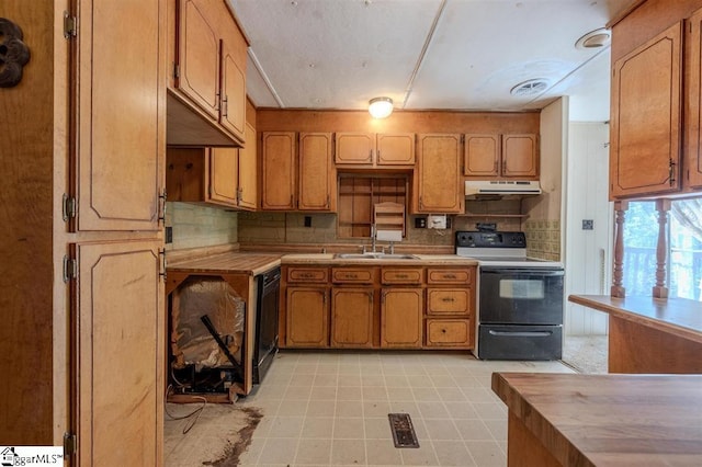 kitchen with black dishwasher, light tile flooring, range with electric cooktop, and tasteful backsplash