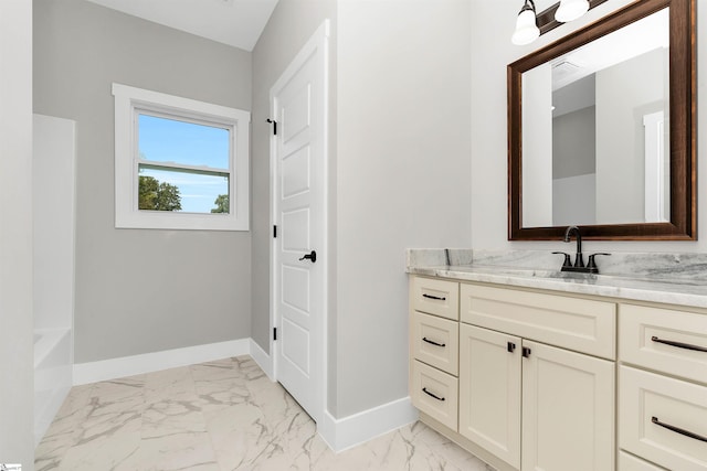 bathroom featuring tile flooring and vanity