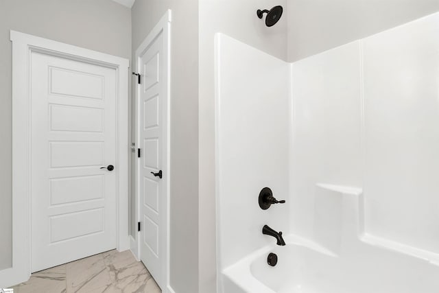 bathroom featuring  shower combination and tile floors