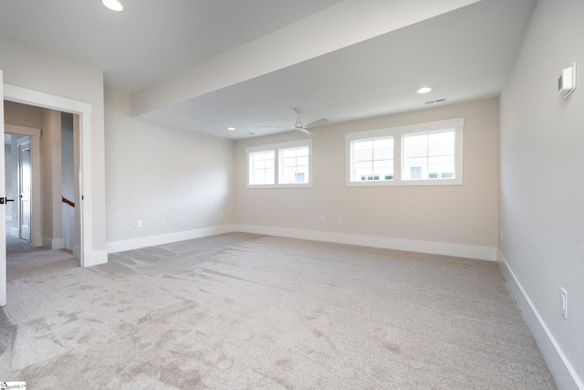 carpeted empty room with ceiling fan