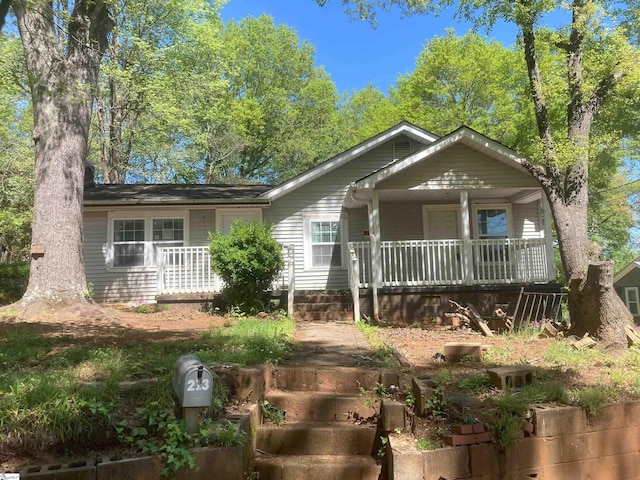 view of front of property featuring covered porch