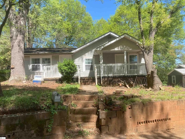 view of front of house with covered porch