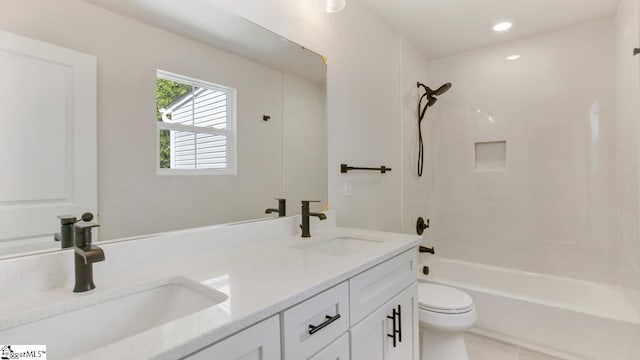 full bathroom with shower / washtub combination, tile floors, oversized vanity, dual sinks, and toilet