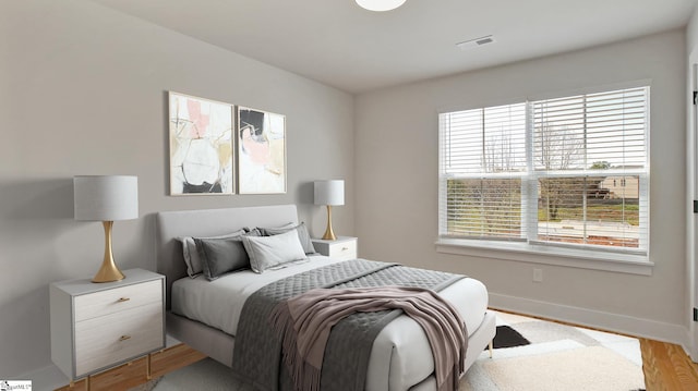 bedroom featuring light hardwood / wood-style floors