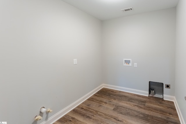 laundry room with gas dryer hookup, dark wood-type flooring, and hookup for a washing machine