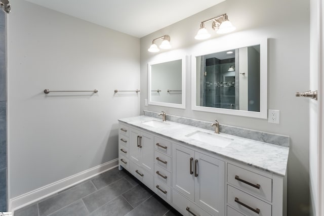 bathroom with double vanity and tile flooring