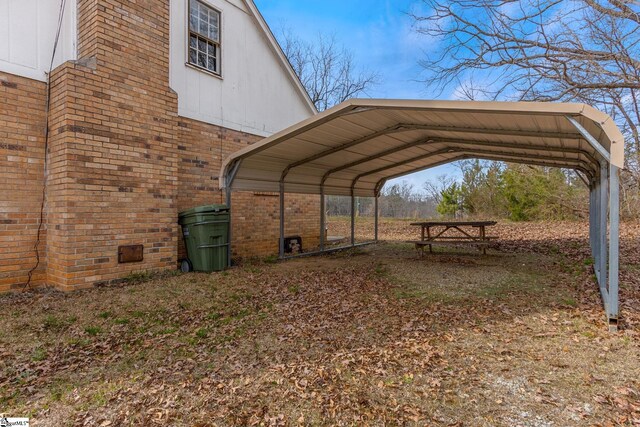 exterior space featuring a carport