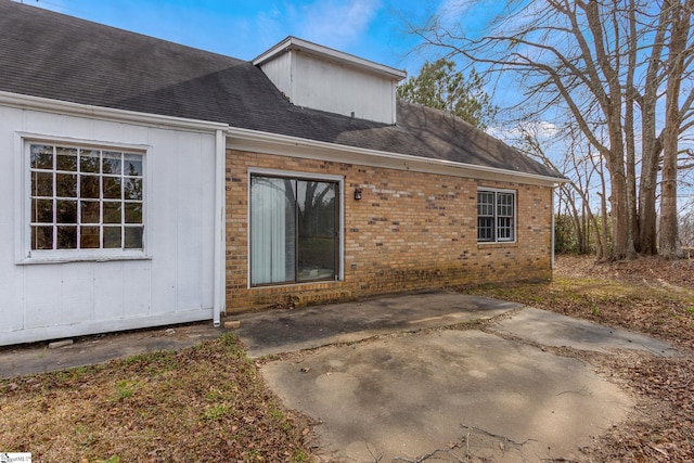 back of house with a patio