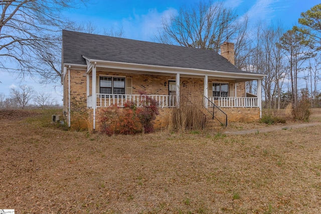 view of front of property featuring covered porch