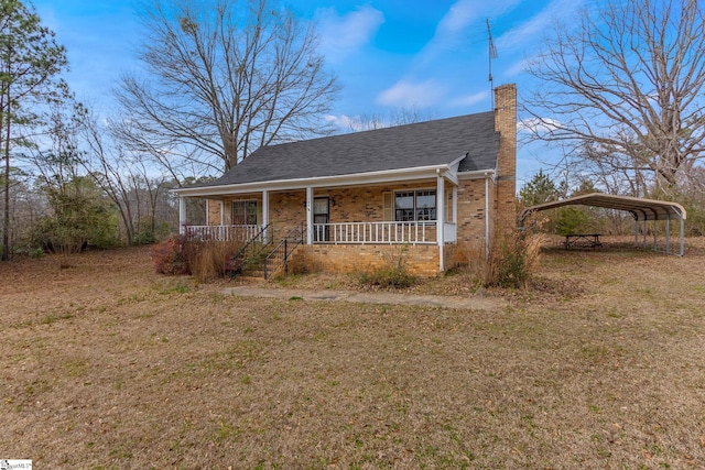 bungalow-style house with a carport and a porch