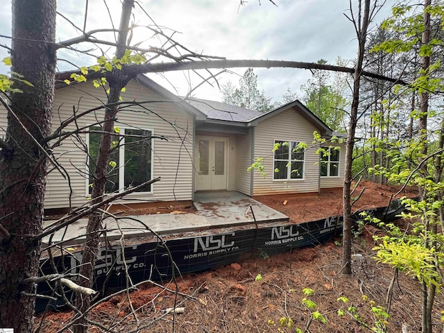 back of property with french doors