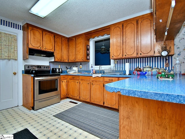 kitchen featuring a textured ceiling, ceiling fan, and stainless steel electric stove