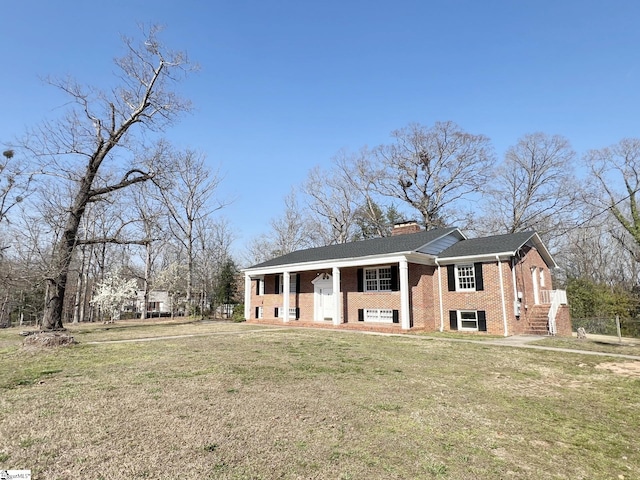 view of front of home with a front yard