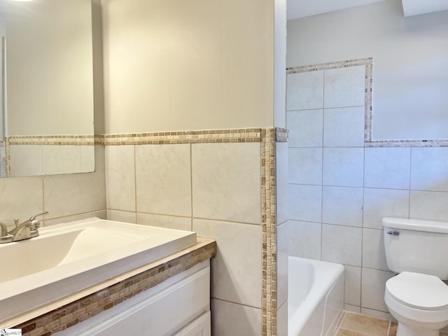 bathroom featuring tile flooring, tile walls, vanity, and toilet