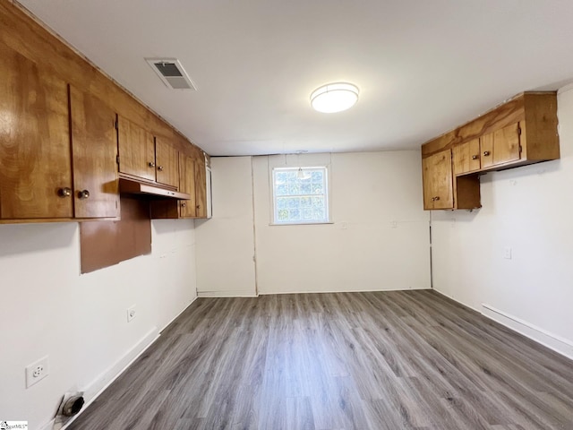 empty room featuring dark hardwood / wood-style flooring