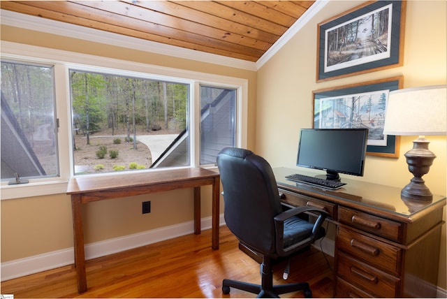 office featuring wood ceiling, ornamental molding, vaulted ceiling, and hardwood / wood-style flooring