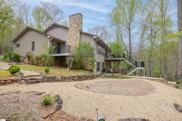 rear view of house with a deck