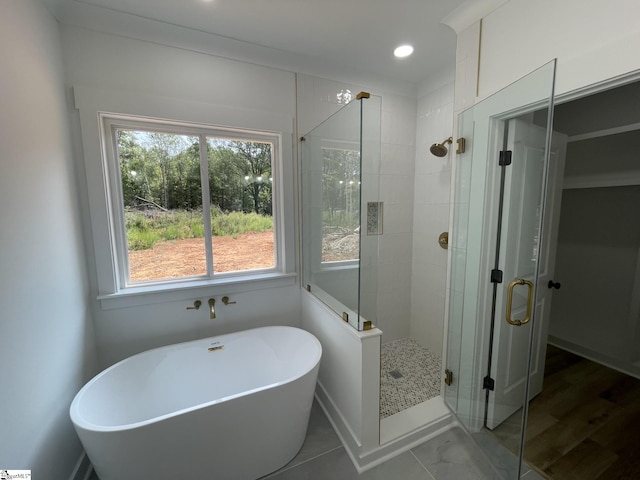 bathroom with independent shower and bath