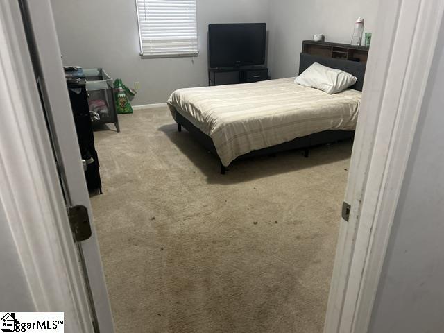 bedroom featuring carpet flooring