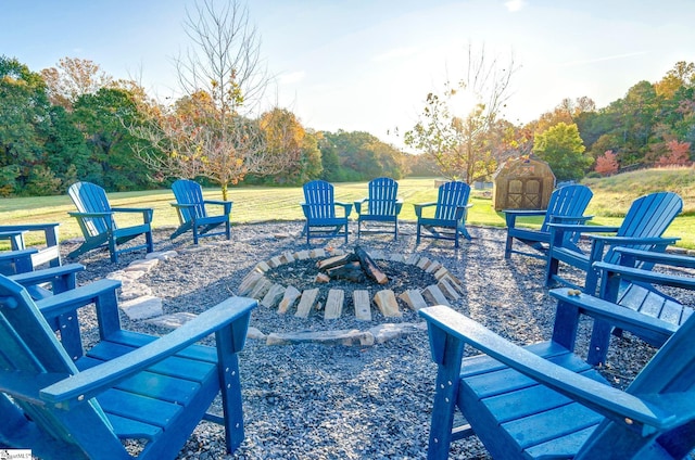 view of terrace featuring an outdoor fire pit