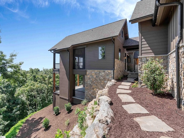 view of front of home with a balcony