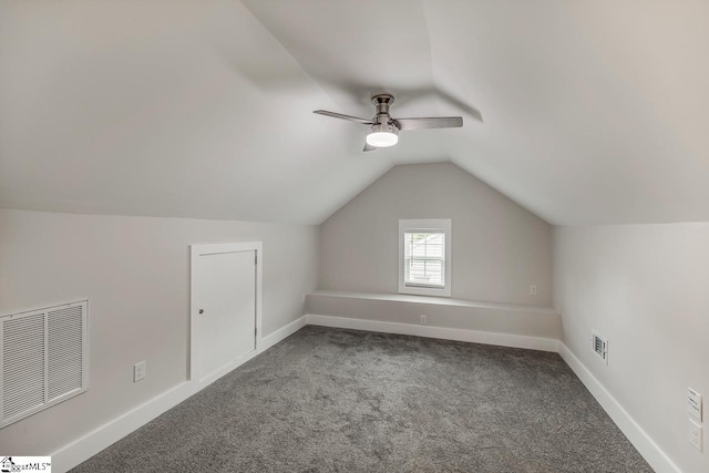 bonus room featuring lofted ceiling, ceiling fan, and carpet floors