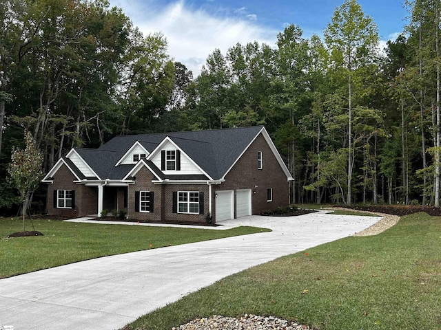 view of front facade featuring a front yard and a garage