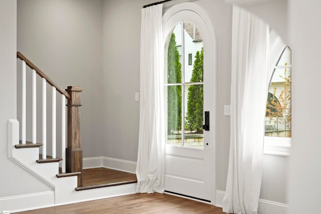 foyer entrance featuring hardwood / wood-style flooring