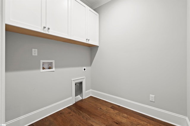 clothes washing area with cabinets, washer hookup, dark hardwood / wood-style floors, and hookup for an electric dryer