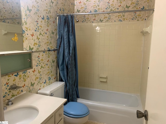 full bathroom with shower / tub combo with curtain, vanity, and toilet