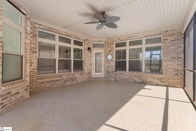 view of patio featuring ceiling fan