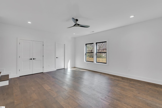 unfurnished bedroom with visible vents, baseboards, recessed lighting, a ceiling fan, and dark wood-style flooring