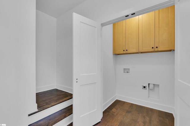 laundry area featuring dark wood finished floors, cabinet space, baseboards, hookup for an electric dryer, and hookup for a washing machine