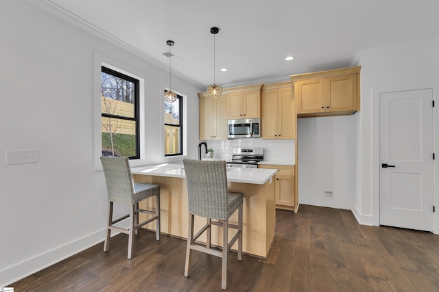 kitchen with backsplash, dark wood-type flooring, light brown cabinetry, light countertops, and stainless steel appliances