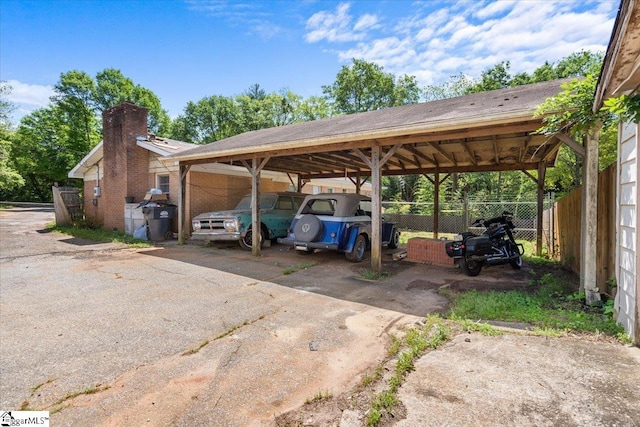 view of car parking featuring a carport