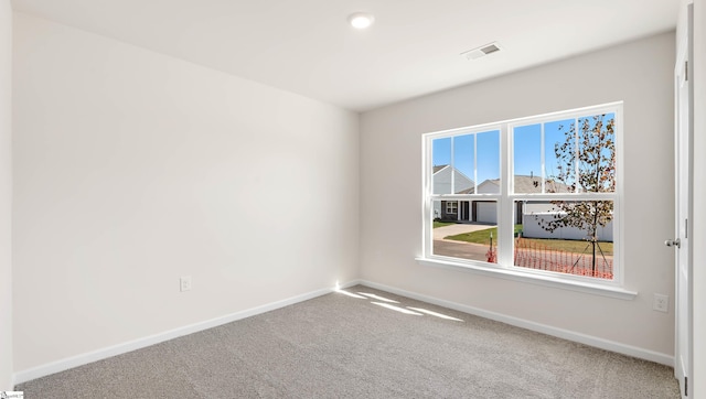 view of carpeted spare room