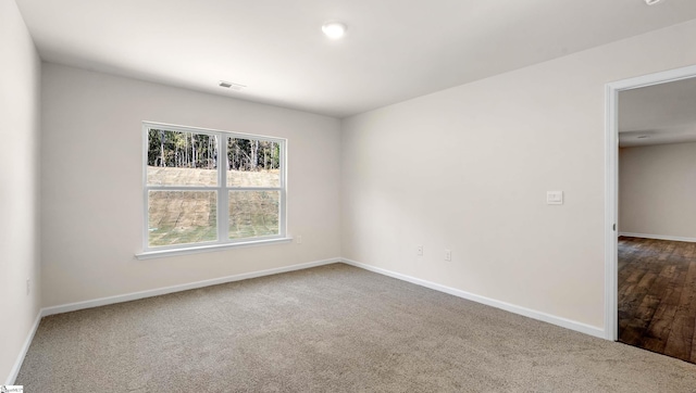 view of carpeted spare room