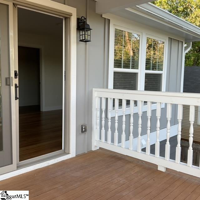 entrance to property with a deck