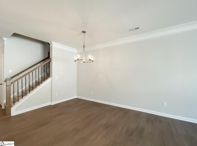 unfurnished dining area featuring visible vents, ornamental molding, dark wood finished floors, stairway, and baseboards