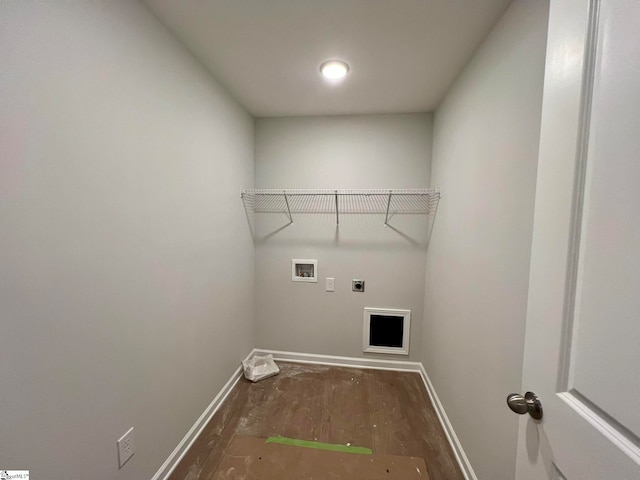 clothes washing area featuring dark wood-type flooring, washer hookup, and hookup for an electric dryer