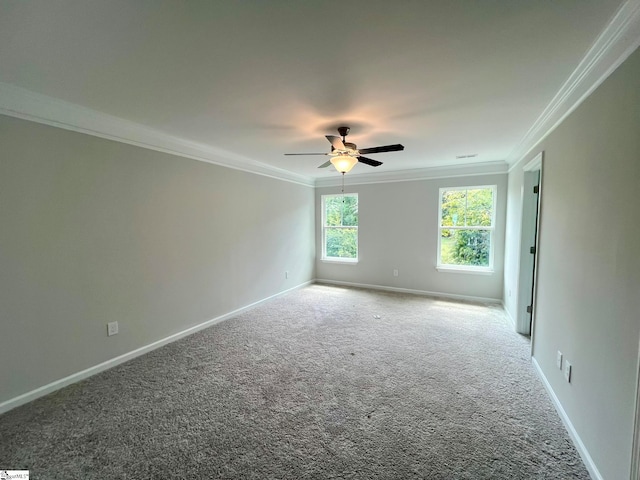 unfurnished room with ceiling fan, ornamental molding, and carpet flooring