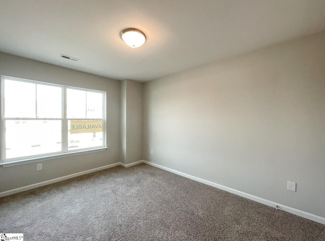 view of carpeted spare room