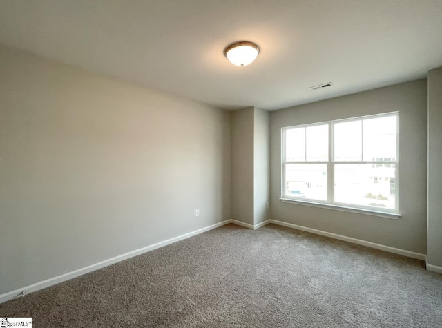 view of carpeted spare room