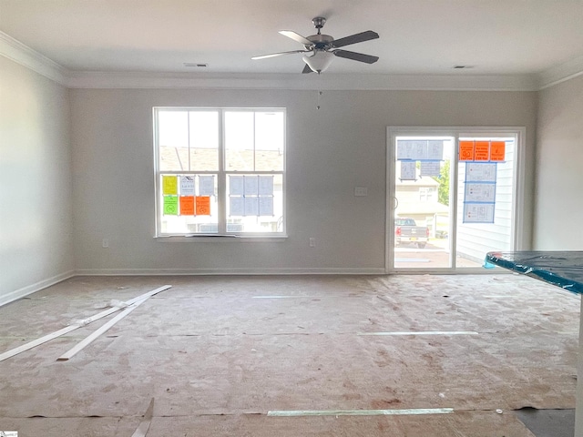 unfurnished room featuring ceiling fan and ornamental molding