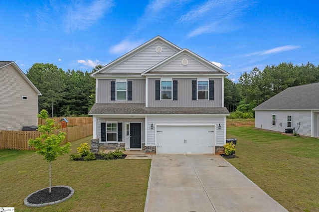 view of front of house with a garage, central AC, and a front lawn