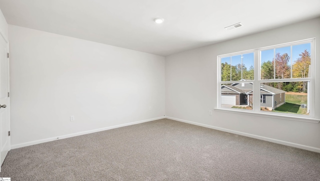 view of carpeted spare room