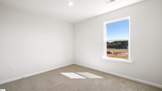 view of carpeted spare room